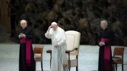 Pope Francis prays at his General Audience in the Vatican's Paul VI Hall, Feb. 2, 2022. Daniel Ibañez/CNA.