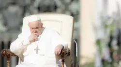 Pope Francis prays at his Wednesday audience in St. Peter’s Square on April 12, 2023. | Daniel Ibáñez/CNA