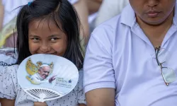 A young Catholic attends the papal Mass at Gelora Bung Karno Stadium in Jakarta on Thursday, Sept. 5, 2024. / Credit: Daniel Ibáñez/CNA