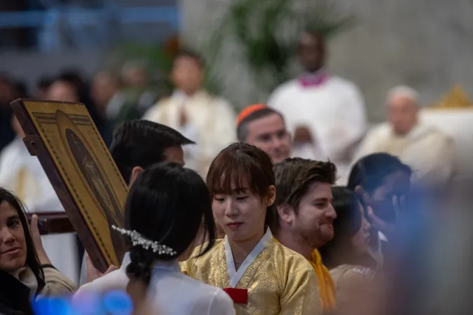 Young Catholics from South Korea participate in the symbolic handover of the Marian icon during the holy Mass for the solemnity of Christ the King, presided over by Pope Francis in St. Peter’s Basilica on Nov. 24, 2024, as part of the preparations for World Youth Day 2027 in Seoul.