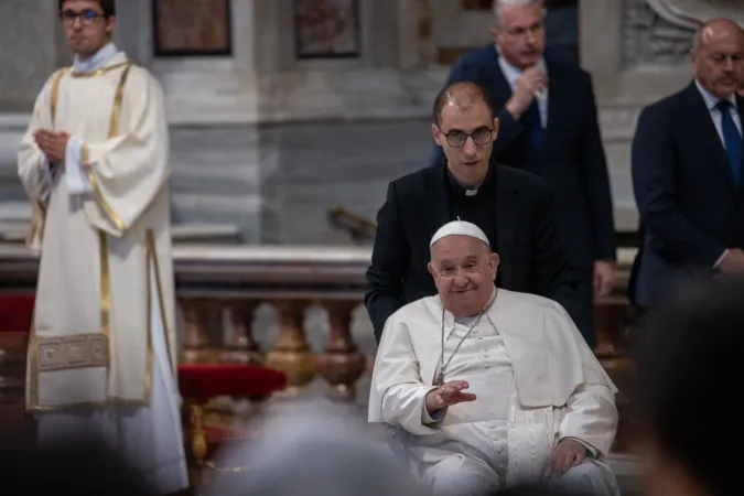 Pope Francis smiles at participants gathered in St. Peter's Basilica at the Vatican for the solemnity of Christ the King, Nov. 24, 2024.