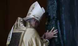 Cardinal Baldassare Reina ceremonially pushes open the Holy Door at St. John Lateran on Dec. 29, 2024. / Credit: Evandro Inetti/EWTN/Vatican Pool