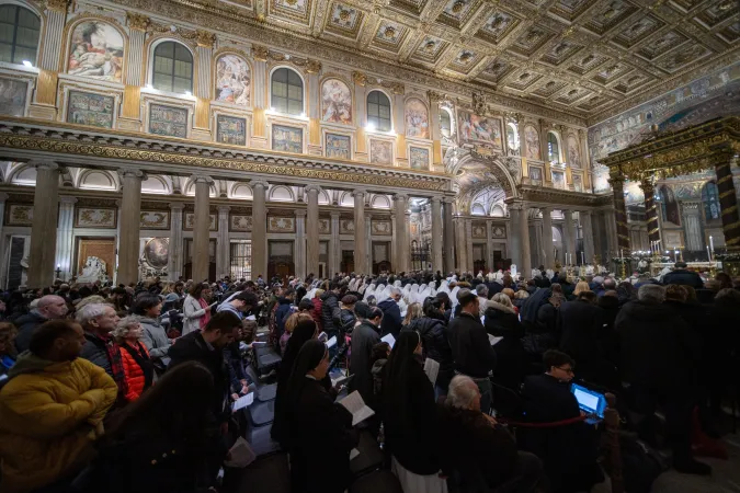 The faithful fill the ornate nave of the Basilica of St. Mary Major during the opening Mass of the Jubilee Year on Jan 1, 2025, in Rome.