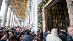 Pilgrims pass through the Holy Door at the Basilica of St. Paul's Outside the Walls on Jan. 5, 2025. / Credit: Daniel Ibañez/CNA