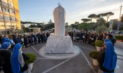 Religious sisters and dozens of faithful gather around the statue of St. John Paul II at Gemelli hospital to pray the rosary for Pope Francis on Saturday afternoon, Feb. 22, 2025 / Credit: Daniel Ibáñez/CNA