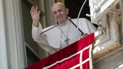 Pope Francis waves from his window overlooking St. Peter’s Square during an Angelus address. Credit: Vatican Media.