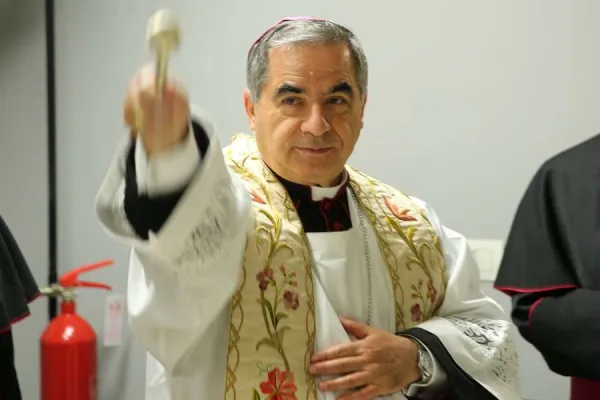 The then Archbishop Angelo Becciu blesses the Pilgrimage Information Center for the Extraordinary Jubilee of Mercy on Dec. 1, 2015. Credit: Daniel Ibáñez/CNA.