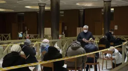 Papal almoner Cardinal Konrad Krajewski with homeless people awaiting vaccinations in the atrium of the Paul VI Hall at the Vatican Jan. 20, 2021. Credit: Vatican Media.