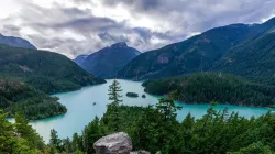 Mountain landscape with lake. Credit: Sergei Akulich via Unsplash.