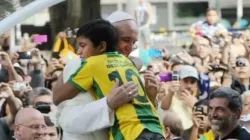 Nathan de Brito hugs Pope Francis during his visit to Rio de Janeiro for World Youth Day 2013. | Credit: Nathan de Brito/personal file