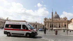 A red cross ambulance passes in front of the Vatican as Italy prepares for the coronavirus, March 9, 2020. Credit: Daniel Ibanez/CNA