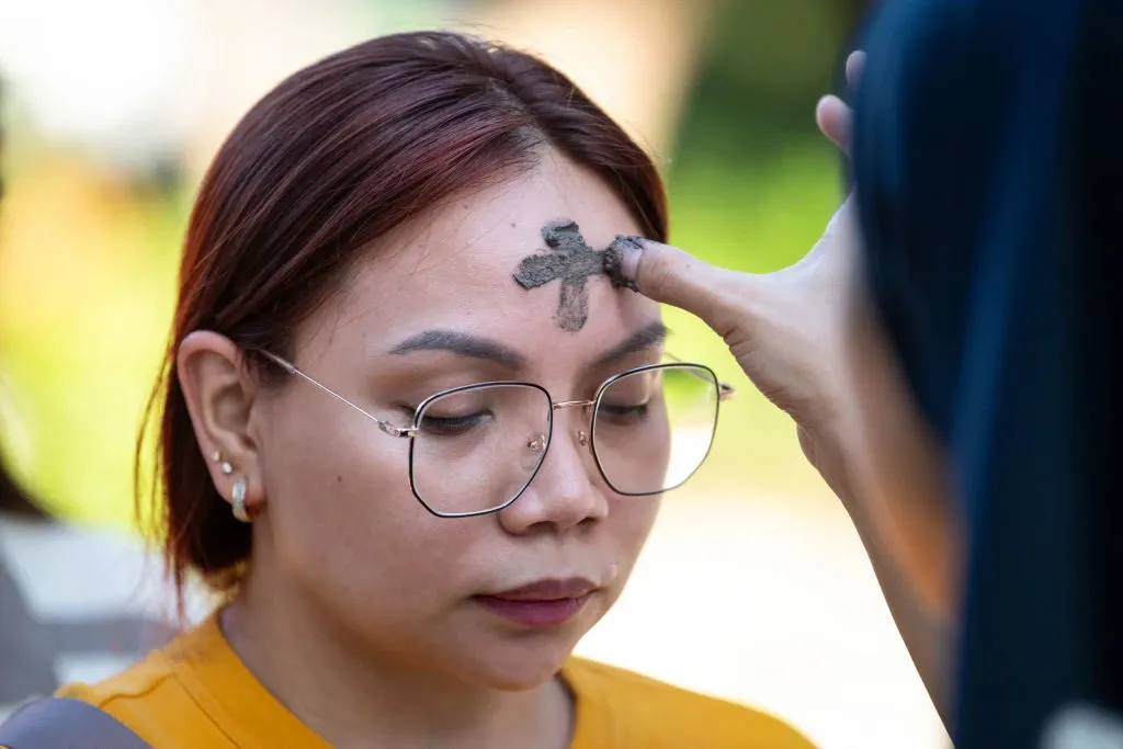 A woman receives ashes on the observance of Ash Wednesday at a church in Manila, Philippines, on March 5, 2025. The 40-day period of Lent begins for Catholics around the world on Ash Wednesday. / Credit: TED ALJIBE/AFP via Getty Images