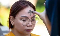 A woman receives ashes on the observance of Ash Wednesday at a church in Manila, Philippines, on March 5, 2025. The 40-day period of Lent begins for Catholics around the world on Ash Wednesday. / Credit: TED ALJIBE/AFP via Getty Images