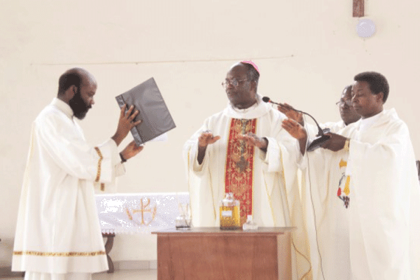 Bishop Emmanuel Fianu, SVD of Ho Diocese in the Volta Region blessing the Oils at the Diocesan Chrism Mass on April 8, 2020 attended by only the Deans of the Diocese. / Diocesan Communications Office