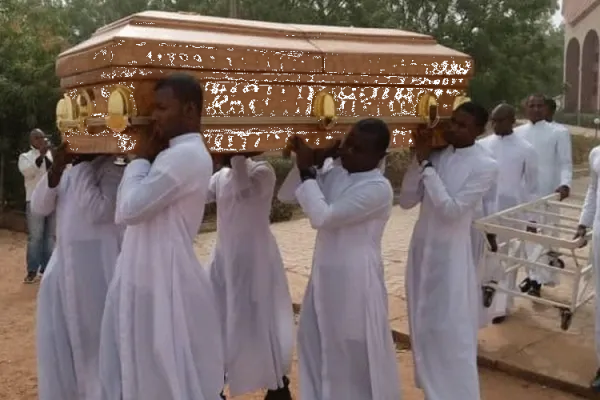 Seminarians carry the coffin of their colleague Michael Nnadi during his burial on February 11