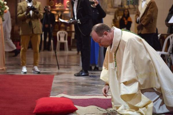 Bishop Nicolas Lhernould Lies Prostate On The Altar Steps during his Episcopal Ordination in Tunis, February 8, 2020.