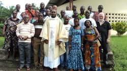 Members of the Association of Catholic Workers of Ivory Coast (MTC-CI) with their chaplain.