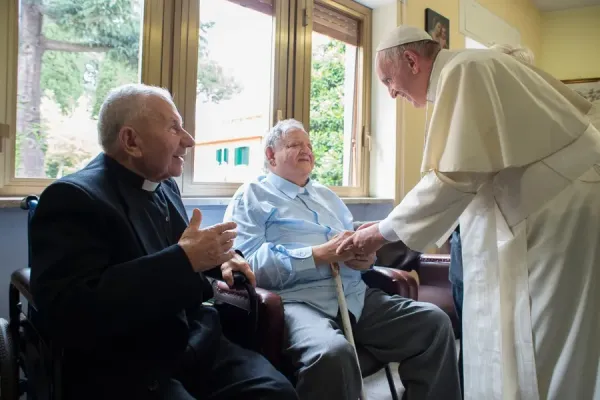 Pope Francis greets the elderly priest-residents of Casa San Gaetano in Rome on June 17, 2016. Vatican Media.