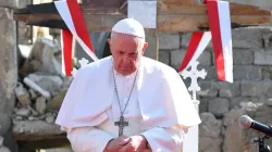 Pope Francis prays at Hosh al-Bieaa (Church square) in Mosul, Iraq, on March 7, 2021. Vatican Media.