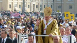 Paolo Gabriele sits in front of Pope Benedict XVI in the popemobile in St. Peter's Square Oct. 24, 2011. / Alan Holdren/CNA.