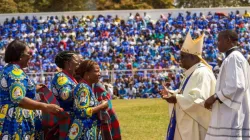 Archbishop George Desmond Tambala of the Catholic Archdiocese of Lilongwe receives gifts from Catholic Women during the Golden Jubilee celebration at Civo Stadium. Credit: ECM