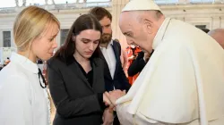 Pope Francis meets Kateryna Prokopenko and Yulya Fedosiuk in St. Peter’s Square on May 11, 2022. Vatican Media.