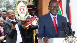 President William Ruto (right) and the Vice Chancellor of Tangaza University (TU), Fr. Prof. Patrick Mwania holding the logo of the institution. Credit: State House Kenya/Institute of Social Communication - Tangaza University