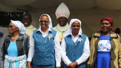 Sr. Mary Kioko (left) and Sr. Rosemary Mwaiwa who celebrated their Silver Jubilee on Friday, June 14 pose for a photo with their mothers. Msgr Peter Makau, Bishop-elect of Kenya's Catholic Diocese of Isiolo, Bishop Paul Kariuki Njiru of Kenya’s Catholic Diocese of Wote look on. Credit: ACI Africa