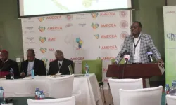 Mr. Robert Mgeni, Head of Programs Catholic Relief Services (CRS) addressing participants during the regional Learning Conference on Care Reform in Nairobi on Tuesday, September 24. Credit: ACI Africa