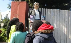 Children gather around the statue of Sr. Anna Ali of the Most Holy Eucharist at the Eucharistic Center in the Catholic Diocese of Eldoret. Credit: ACI Africa