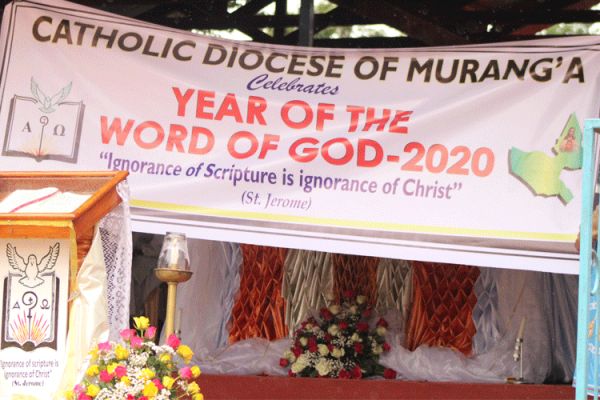 Banner to mark the Year of the Word of God in the Catholic Diocese of Muranga. On the left, an enthroned Word of God. / ACI Africa