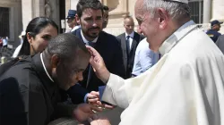 Pope Francis blesses Fr. Don Bosco Onyalla / Vatican Media