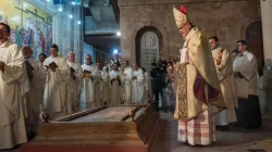 With the incense burned from the newly blessed fire, Cardinal Pierbattista Pizzaballa, the Latin patriarch of Jerusalem, incenses the "Stone of Anointing," located at the entrance of the Basilica of the Holy Sepulcher, where, according to tradition, the body of Jesus was anointed and prepared with aromatic oils for burial. March 30, 2024. / Credit: Marinella Bandini