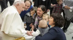 Pope Francis greets families after the general audience on Feb. 2, 2022. Vatican Media