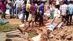 Victims of demolitions in a village within Kenya's Catholic Diocese of Embu standing near the rubble of their demolished structures/ Credit: Agenzia Fides