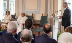 Pope Francis sits next to Queen Mathilde and listens as King Philippe (far right) speaks during a meeting between the pope and dignitaries in the Grand Gallery of Belgium’s Laeken Castle on Friday, Sept. 27, 2024. / Credit: Daniel Ibáñez/CNA