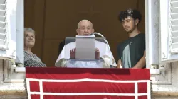 Pope Francis is flanked by a grandmother and grandson during his Angelus reflection on July 23, 2023, in honor of the World Day for Grandparents and the Elderly. | Vatican Media