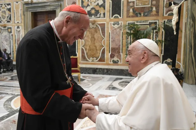 Pope Francis and Cardinal Christoph Schönborn, the archbishop of Vienna, greet each other during an audience with the International Catholic Legislators Network in the Clementine Hall of the Vatican on Aug. 24, 2024.