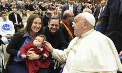 Pope Francis blesses a baby during the Saturday jubilee audience in the Vatican’s audience hall on Jan. 11, 2025. / Credit: Vatican Media