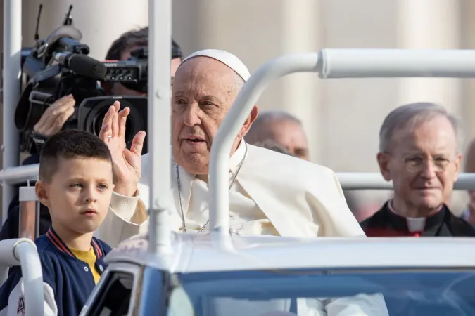 Pope Francis waves from the popemobile as he greets thousands of people in St. Peter’s Square for his weekly Wednesday general audience on Sept. 25, 2024.