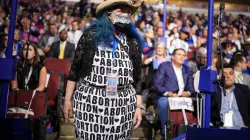 A pro-abortion attendee stands during the first day of the Democratic National Convention at the United Center on Aug. 19, 2024, in Chicago. / Credit: Andrew Harnik/Getty Images