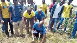 Samuel Zan Akologo, the Knights of Marshall Supreme Officer Responsible for MAREDES and Advocacy, planting a seedling. Credit: Business Ghana