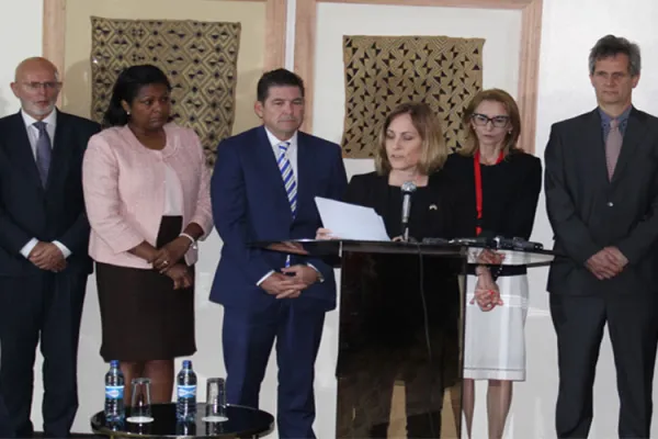US government Head of Delegation Valerie Huber (on mic) reads the joint statement by ten countries flanked by various government representatives who are party to the statement. / ACI Africa