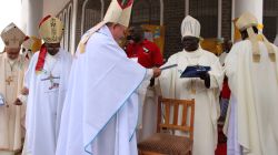 Bishop Maurice Crowley (L)  hands over his signed copy of the anti-corruption declaration to KCCB Chairman, Archbishop Philip Anyolo / ACI Africa