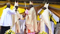 Outgoing Kericho Bishop, Emmanuel Okombo hands over the crosier to Bishop Alfred Rotich. The crosier is a sign of a bishop's authority and jurisdiction. / ACI Africa