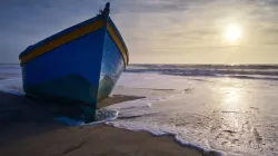 A migrant boat on the beach at Camposoto San Fernando Cádiz, Spain. | Credit: Shutterstock