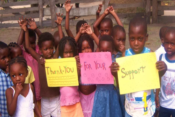 Thankful Mozambican children expressing gratitude to the international community for support after Cyclone Idai