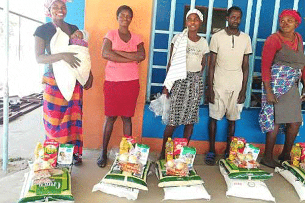 Some members of the Don Bosco Youth Center after receiving nutritional support from Salesian Missions donors in Namibia / Mission Newswire