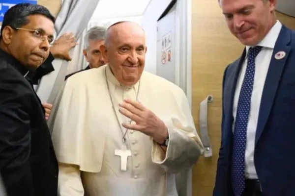 Pope Francis on board the plane that took him from Rome to Mongolia, Aug. 31, 2023. | Credit: Vatican Media