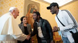 Pope Francis meets with refugees whom he helped to bring to Italy on his 85th birthday, Dec. 17, 2021. Vatican Media